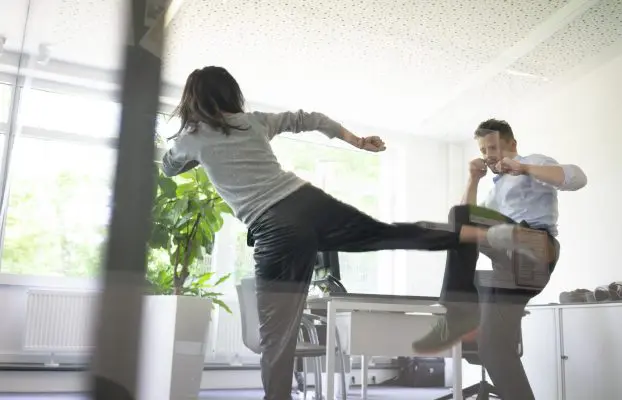 Facilities and Schools 18 | businessman and businesswoman fighting in office 2022 12 16 22 05 55 utc scaled 1 AI’s role in workplace violence prevention